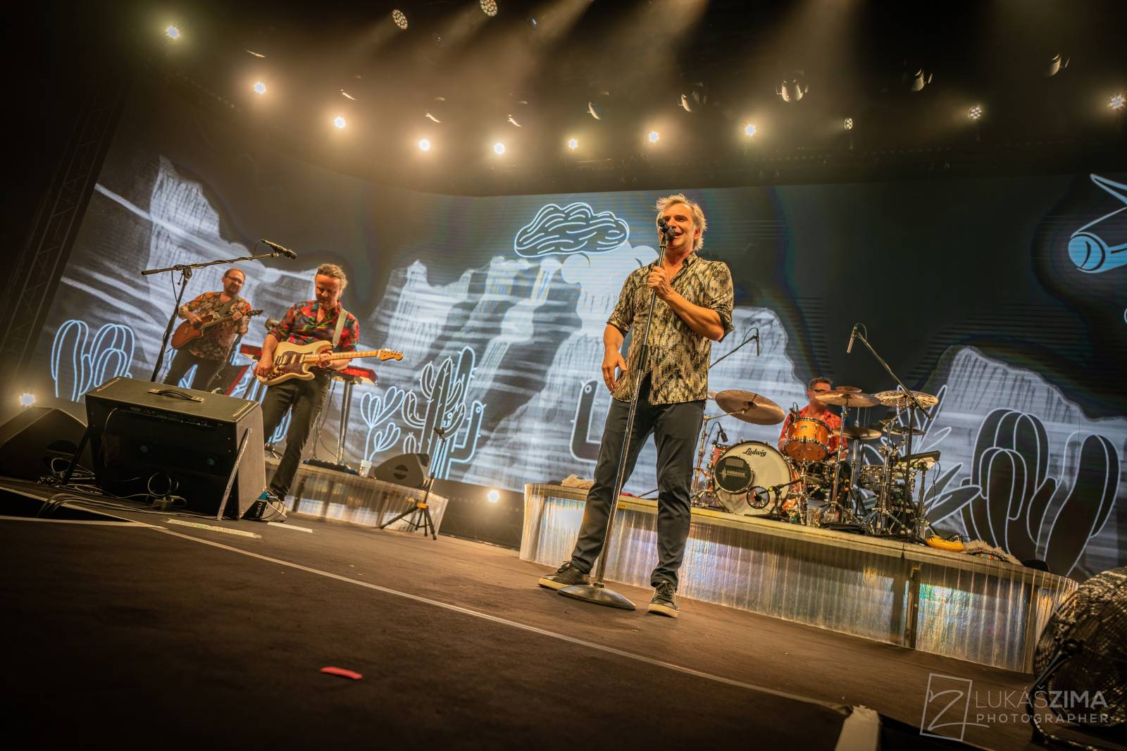 Mig 21 oslavili čtvrtstoletí vyprodaným koncertem ve Foru Karlín