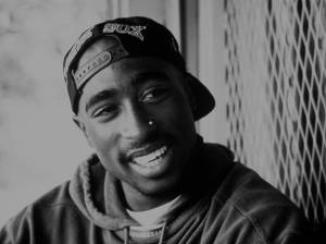 SMRT SI ŘÍKÁ ROCK'N'ROLL: Tupac Shakur (38.)