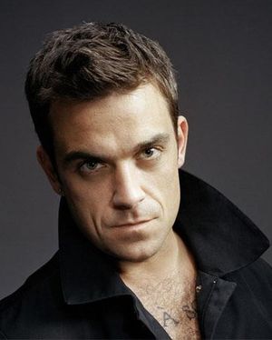 Robbie Williams stárne, vítězství v Brit Awards oslavil jen čajem a sušenkami 