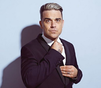 RECENZE: Robbie Williams opět swinguje s noblesou